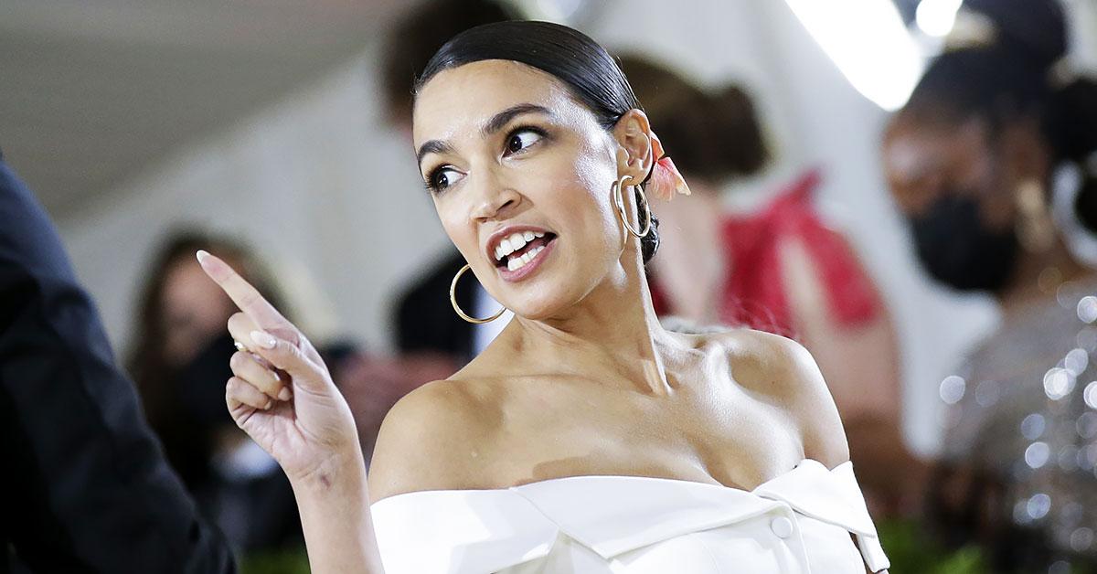 Alexandria Ocasio Cortez Rocks Ironic Tax The Rich Gown At Met Gala