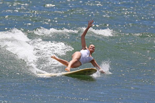 Wipe Out Margot Robbie Takes A Tumble Surfing In See Through White