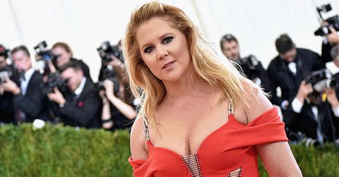woman in red dress at event
