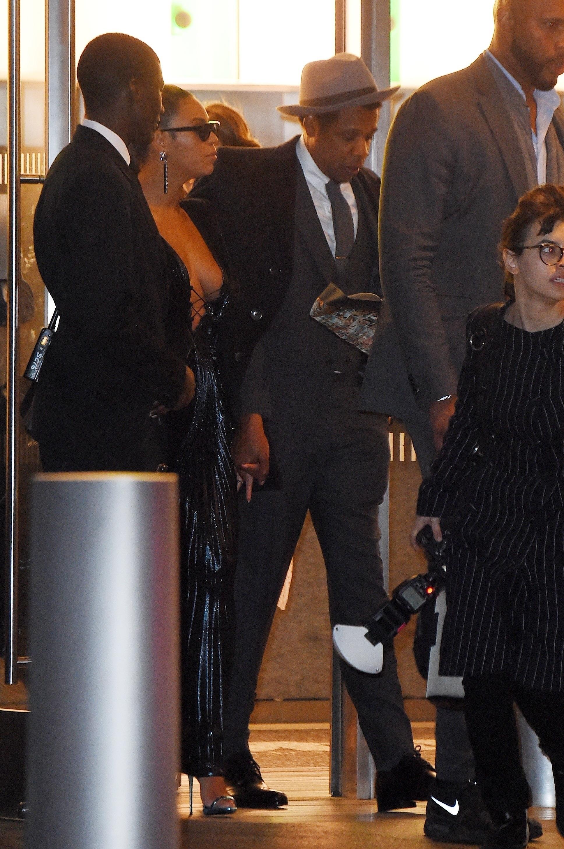 Beyonce and Jay Z hold hands as they leave Roc Nation brunch