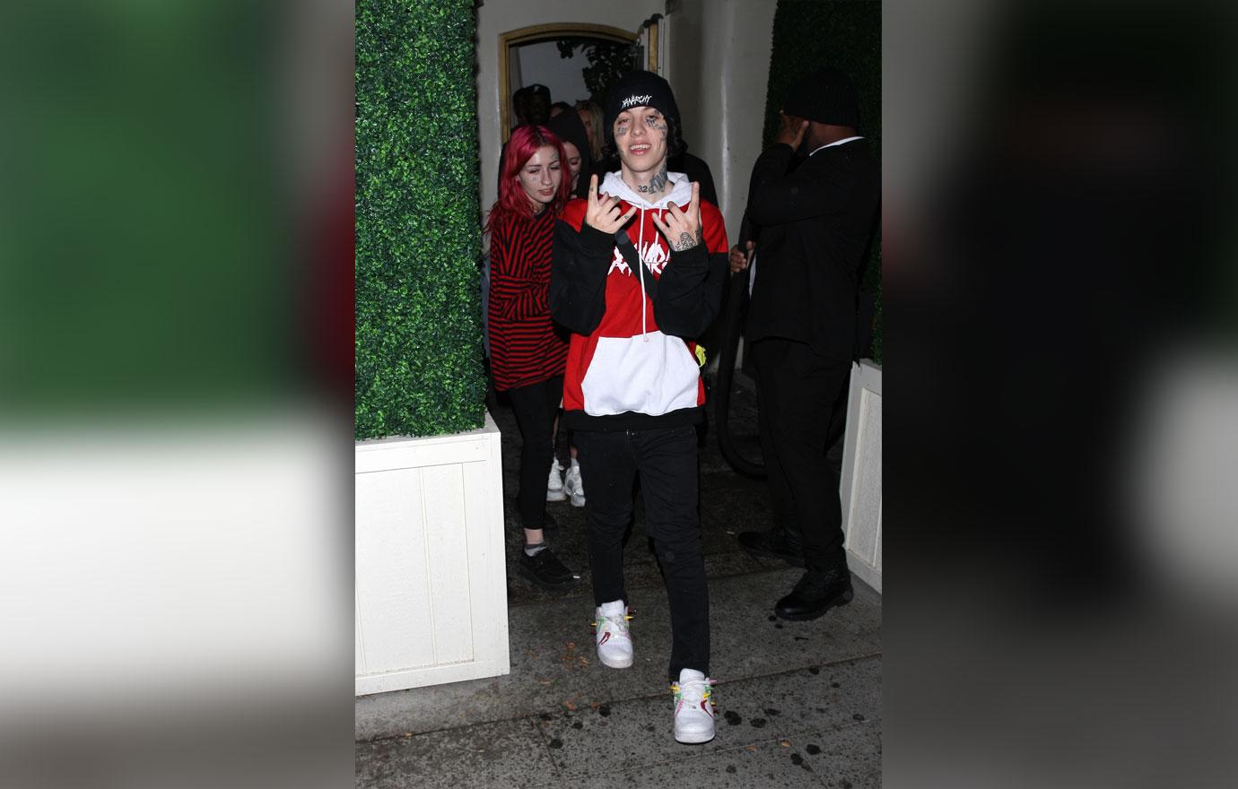 Rapper Lil Xan is seen leaving Delilah restaurant with his friends