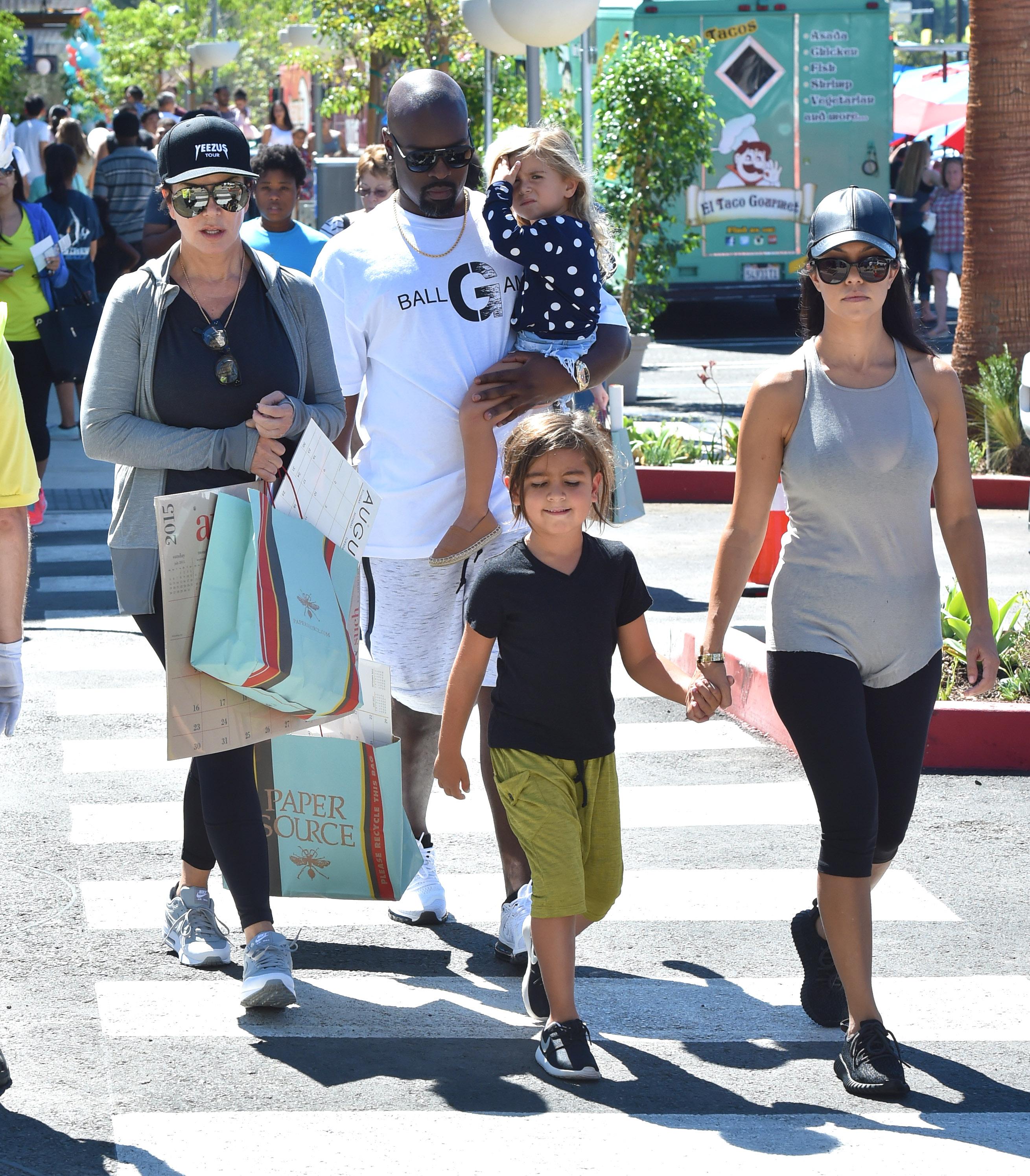 Kourtney Kardashian along with Mason And Penelope And Kris Jenner And her boyfriend Corey Gamble go to the Farmers Market