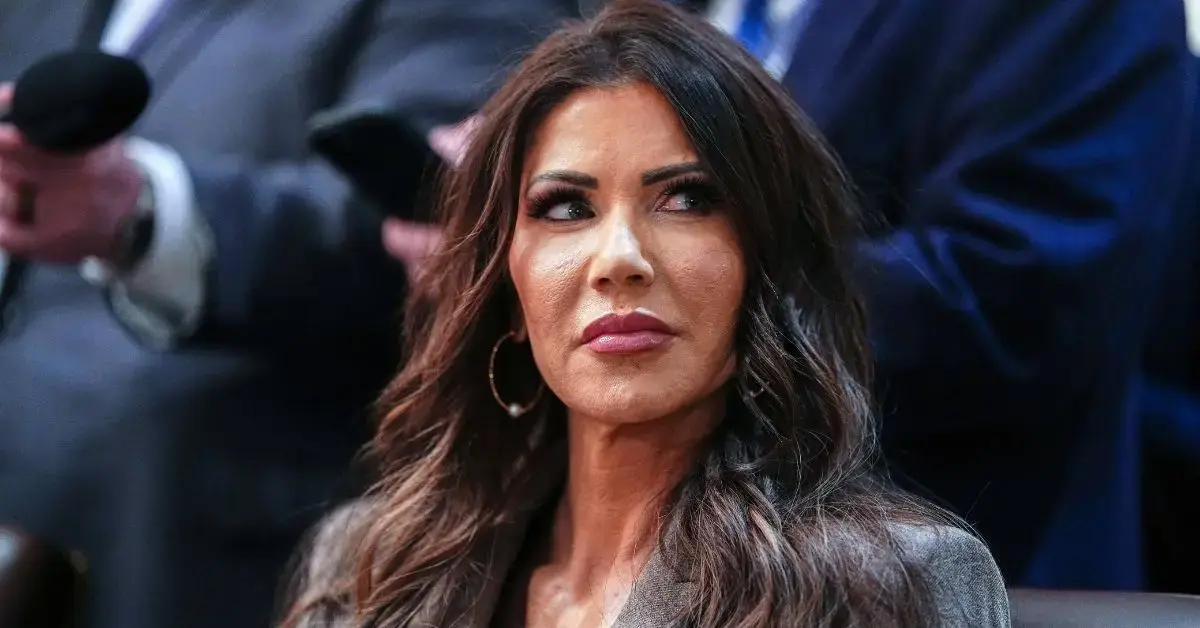 image of Donald Trump reassigned Kristi Noem to a different role. 