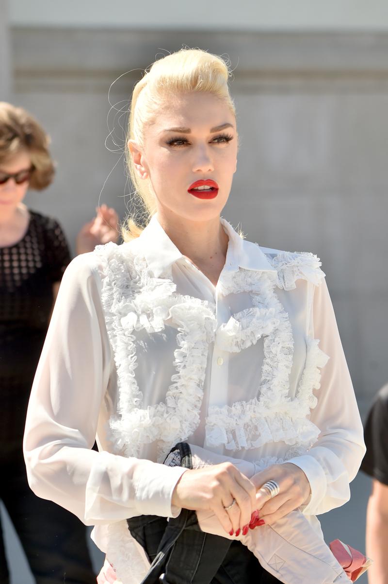 Gwen Stefani Exposes Black Bra In A Sheer White Top As She Takes