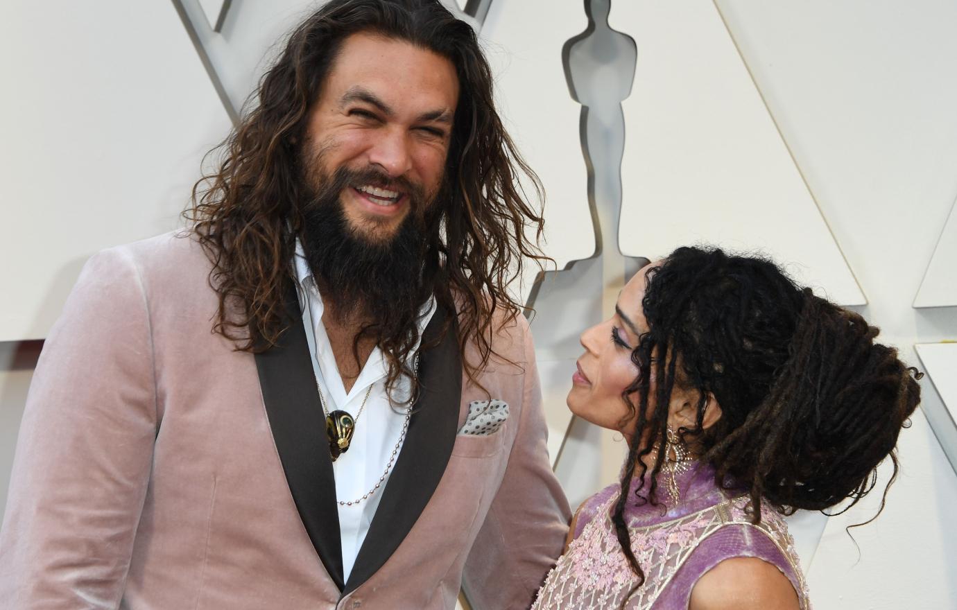 Jason Momoa and Lisa Bonet smiling together