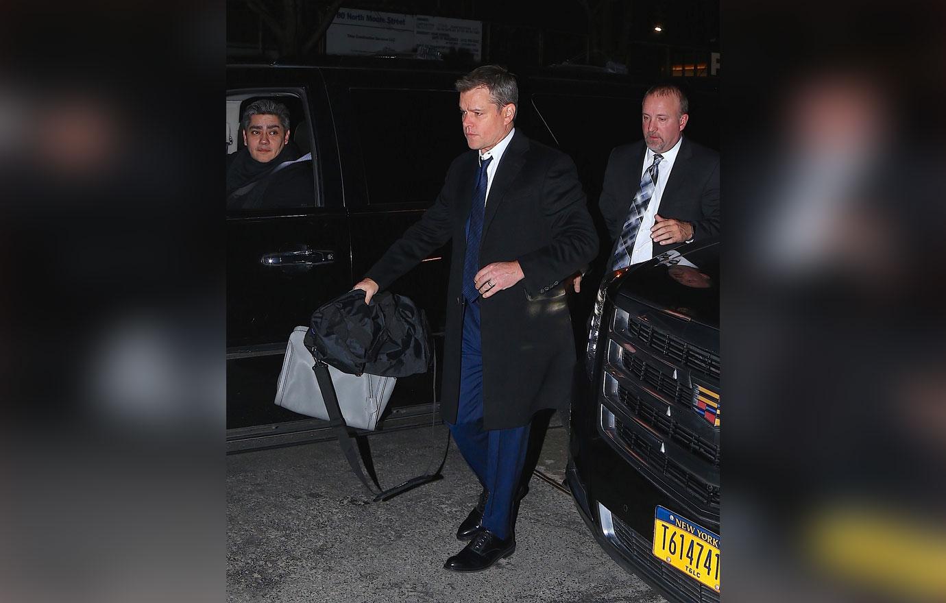 Matt damon carries wife purse