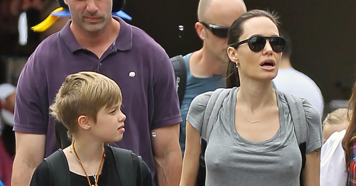[PICS] Angelina Jolies Ditches Her Bra During Trip To Disneyland