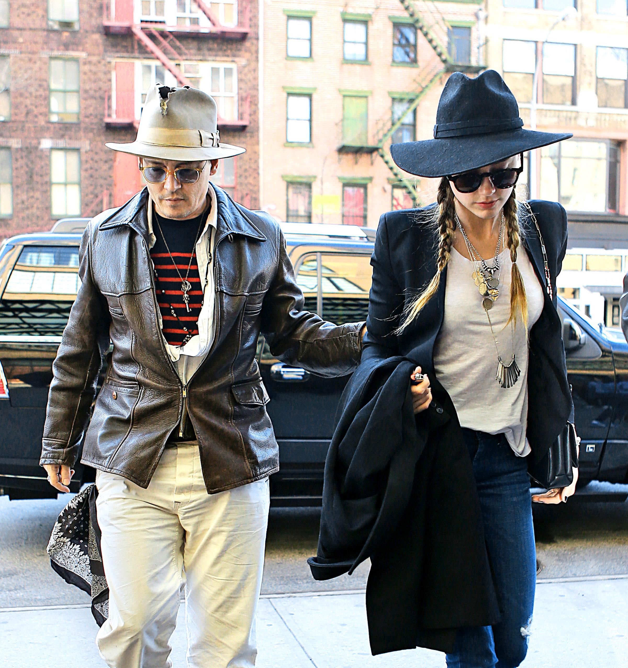 Johnny Depp and Amber Heard arrive back at their NYC hotel after a shopping trip