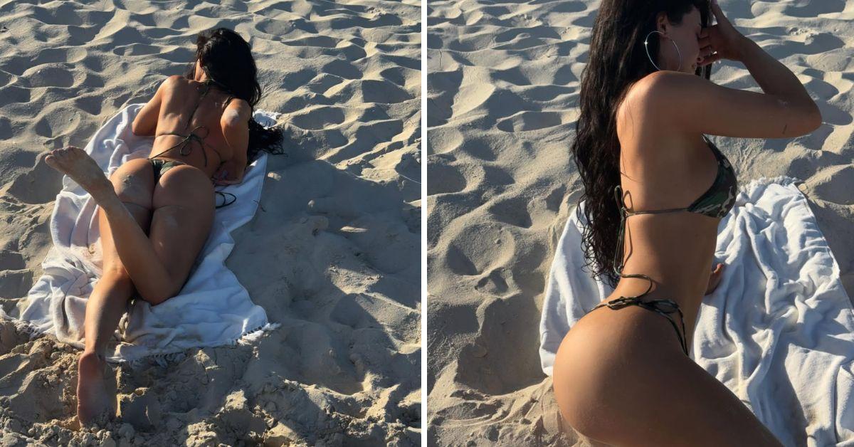 image of The reality star relaxed by the ocean and posed on the sand as she enjoyed a tropical getaway.