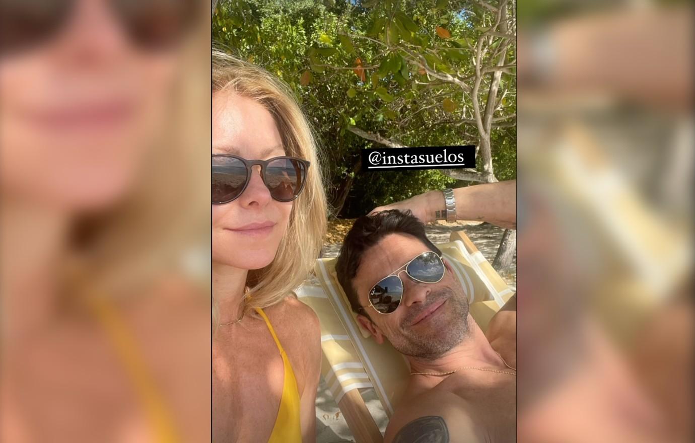 Kelly Ripa, Mark Consuelos Relax On The Beach Before Cohosting Live! picture photo