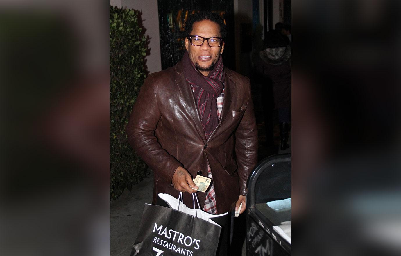 D.L. HUGHLEY LEAVING A RESTAURANT IN BEVERLY HILLS.