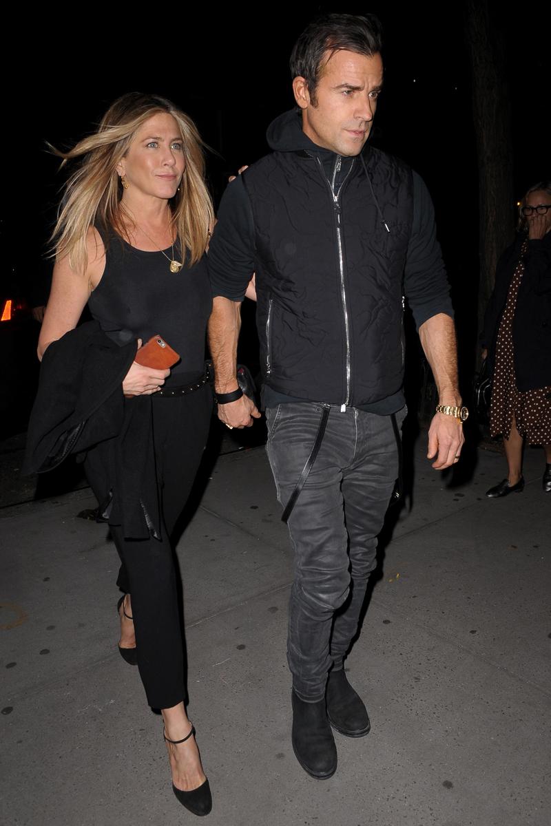 Jennifer Aniston and Justin Theroux happily hold hands after dinner