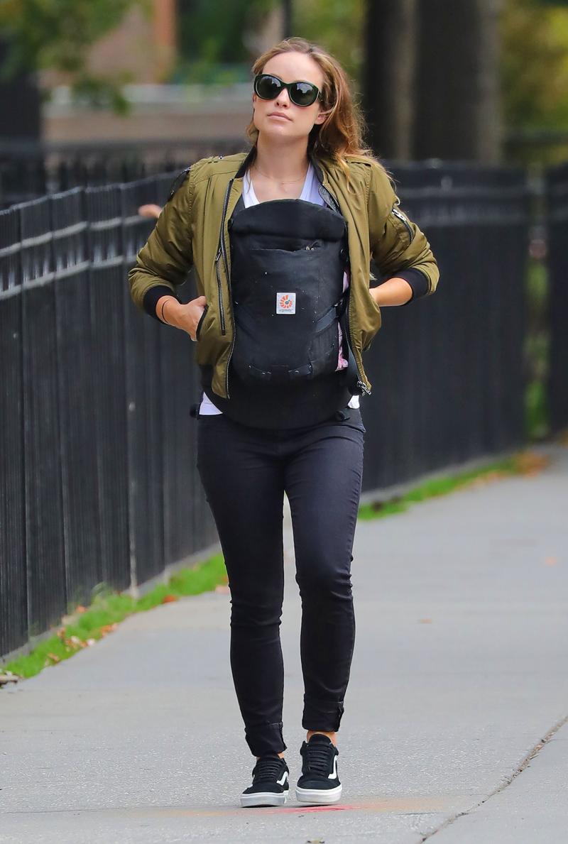 EXCLUSIVE: **PREMIUM EXCLUSIVE RATES APPLY** First shots of Olivia Wilde with baby Daisy in a sling during a walk in Brooklyn, NY