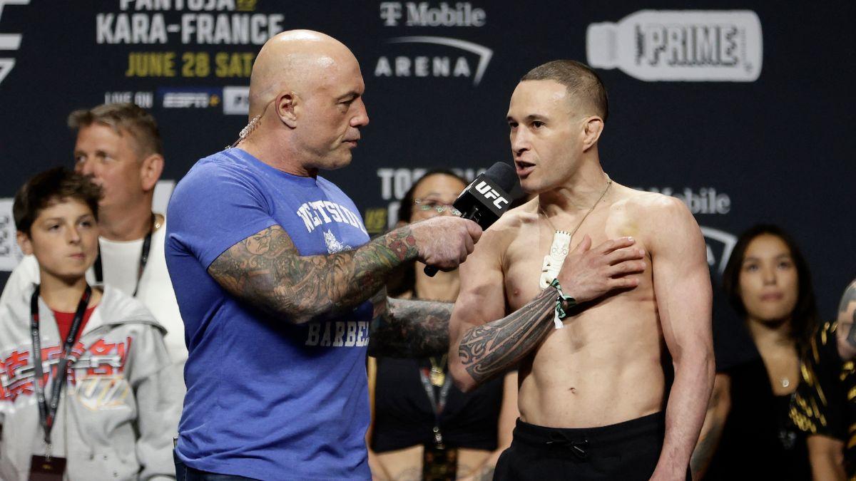 Image of Joe Rogan argued title fights belonged in controlled arenas.