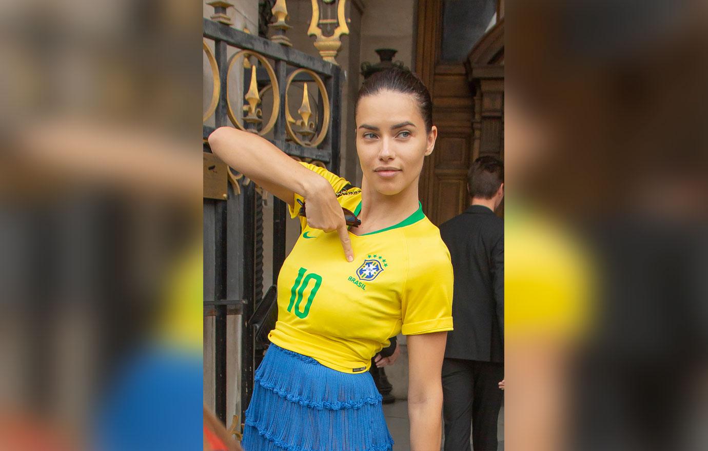 Adriana Lima Wears a Brazil Soccer Jersey At Couture Fashion Week