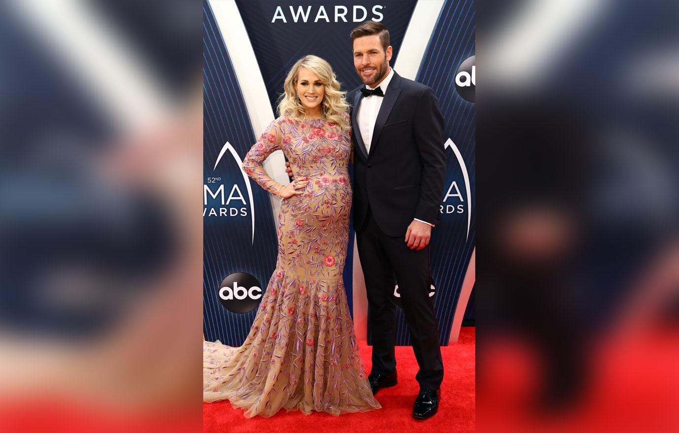 Carrie Underwood wins big at the CMT Awards as Mike Fisher makes a rare red  carpet appearance to play the supportive husband