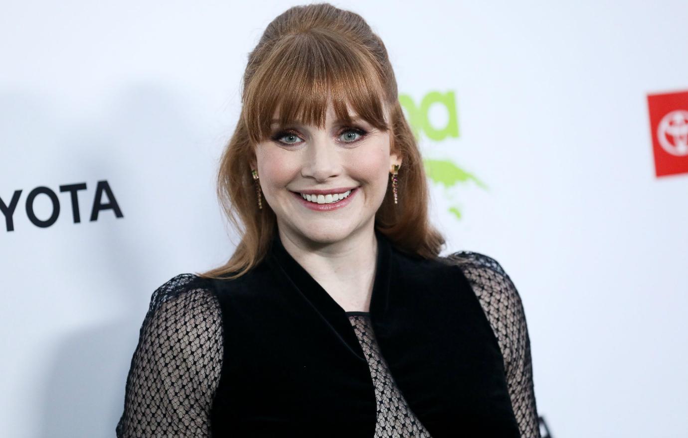 Bryce Dallas Howard smiled brightly as she sported a black, lacy, formal dress at a recent event.