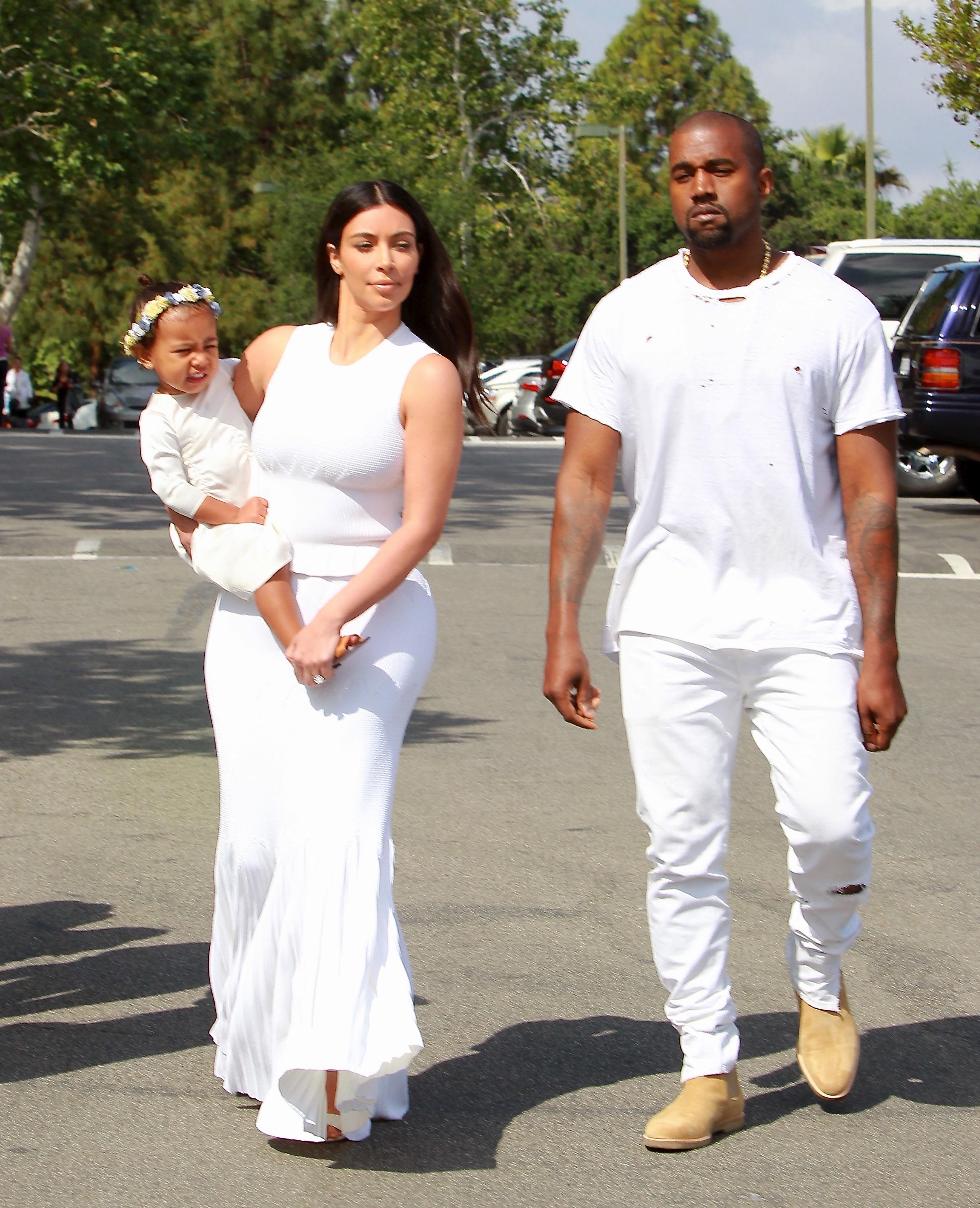 Kim, Kanye, and Little North are all decked in white for Easter Sunday