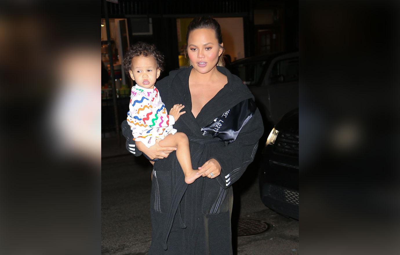 Chrissy Teigen seen carrying her daughter Luna in New York City