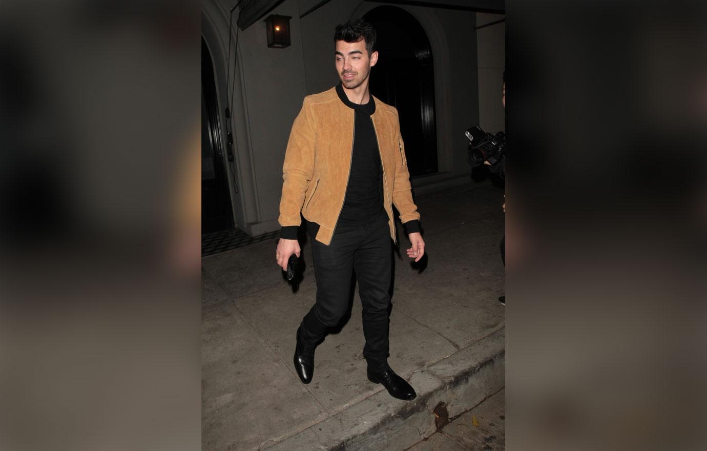 Joe Jonas leaving Craig&#8217;s with a mystery woman .