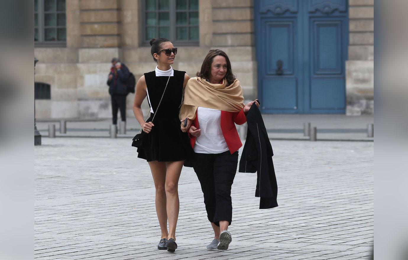 Nina Dobrev and her mother strolling in Paris