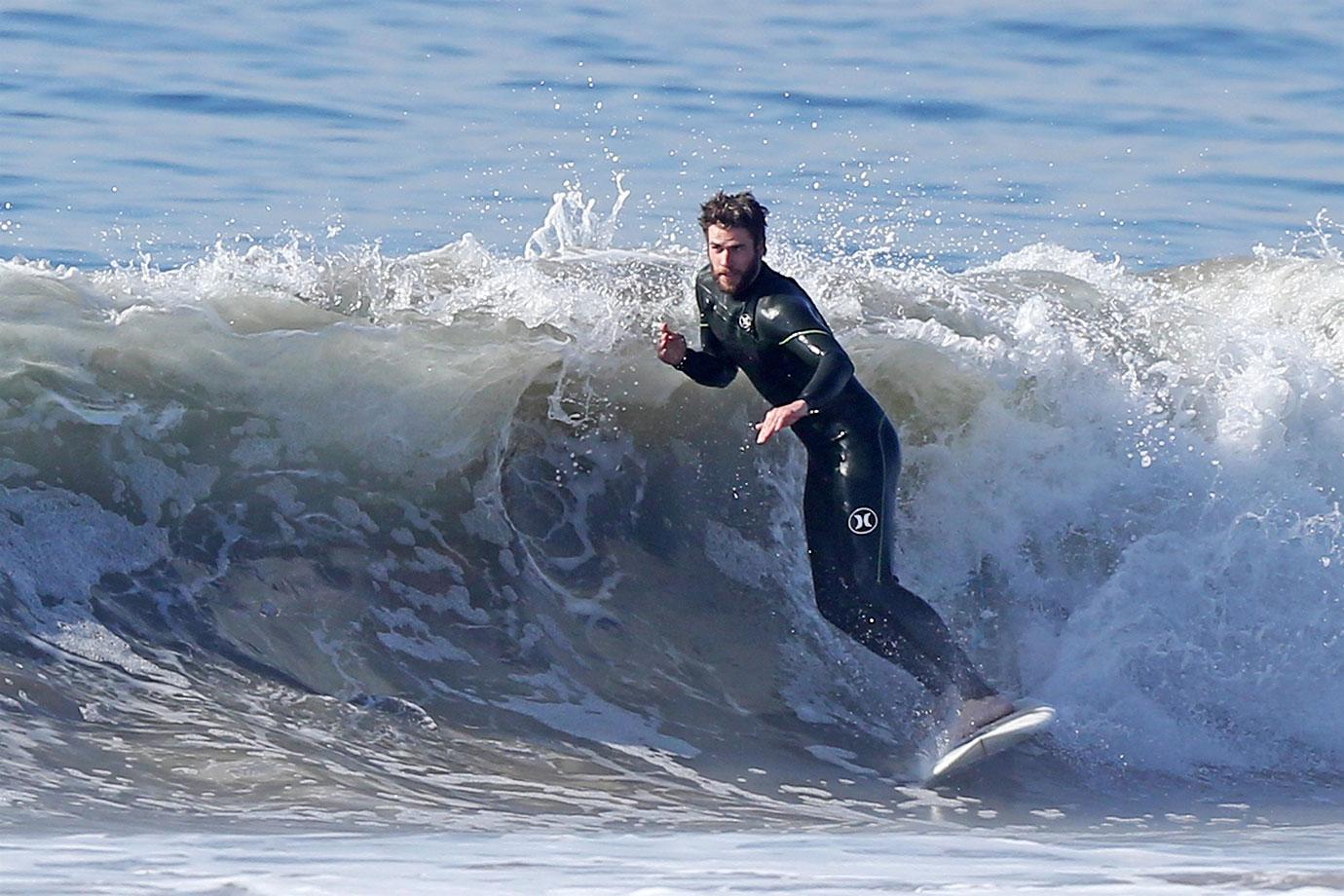 Liam Hemsworth Shirtless Abs Chest Surfing