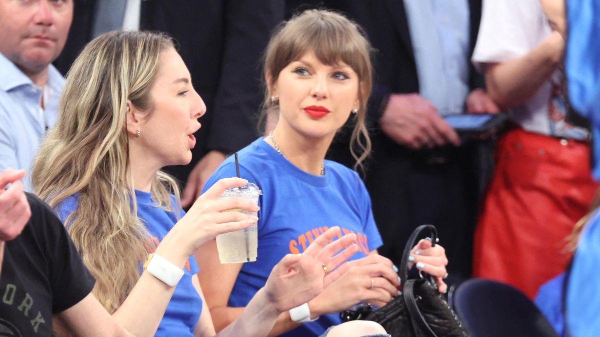 Photo of Taylor Swift and her friends rocked custom punny T-shirts for the Knicks game.