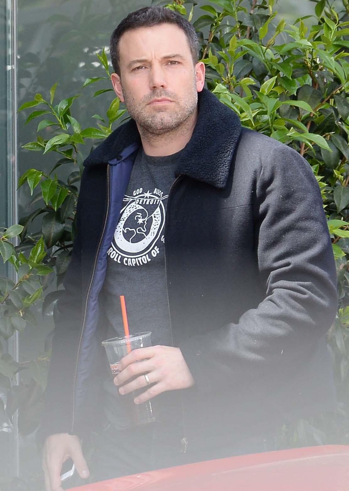 Ben Affleck is spotted out in his maroon chevelle as he heads to his office in Santa Monica, Ca