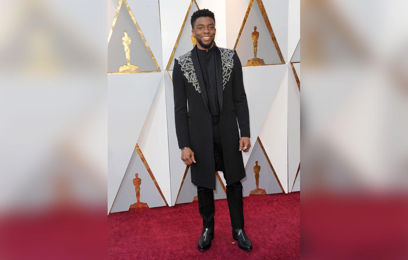 A Look Back At Chadwick Boseman's Best Red Carpet Looks