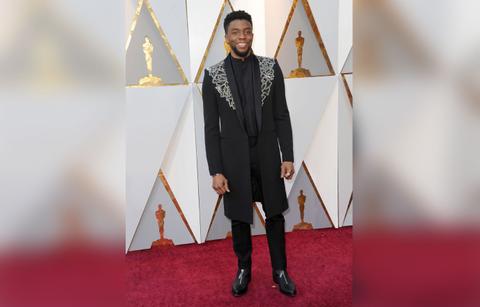 A Look Back At Chadwick Boseman's Best Red Carpet Looks