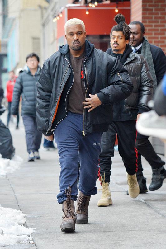 Kanye West shows off his new hair in Soho