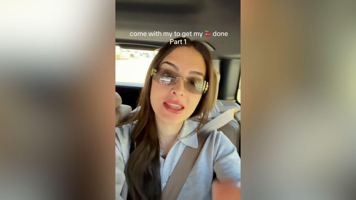 Image of Sophia Umansky admired her results post-procedure.