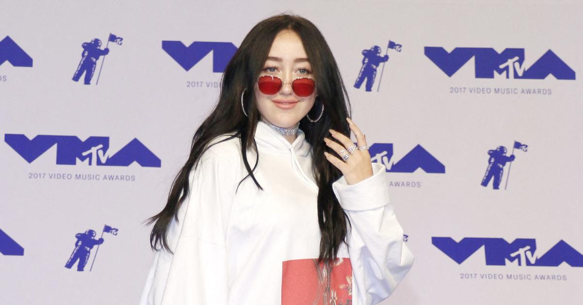 noah cyrus hourglass figure tiny string bikini family feud photos