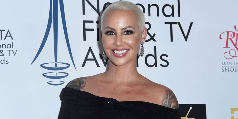 Amber Rose Shows off a Fans Arm Tattoo with Images of Her and Rihanna   See the Cool Portrait