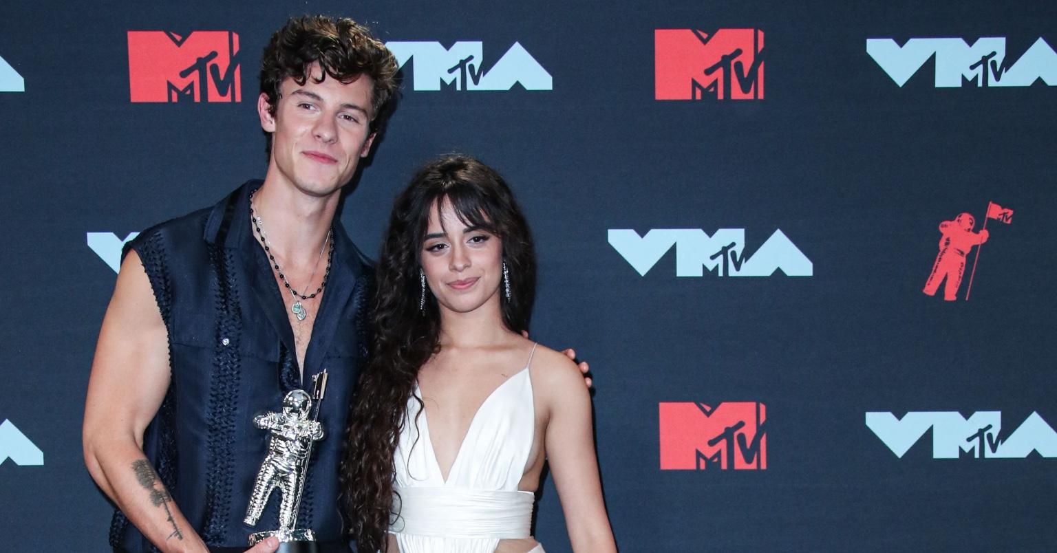 Shawn Mendes Picks Up a Camera While Camila Cabello Waits in the