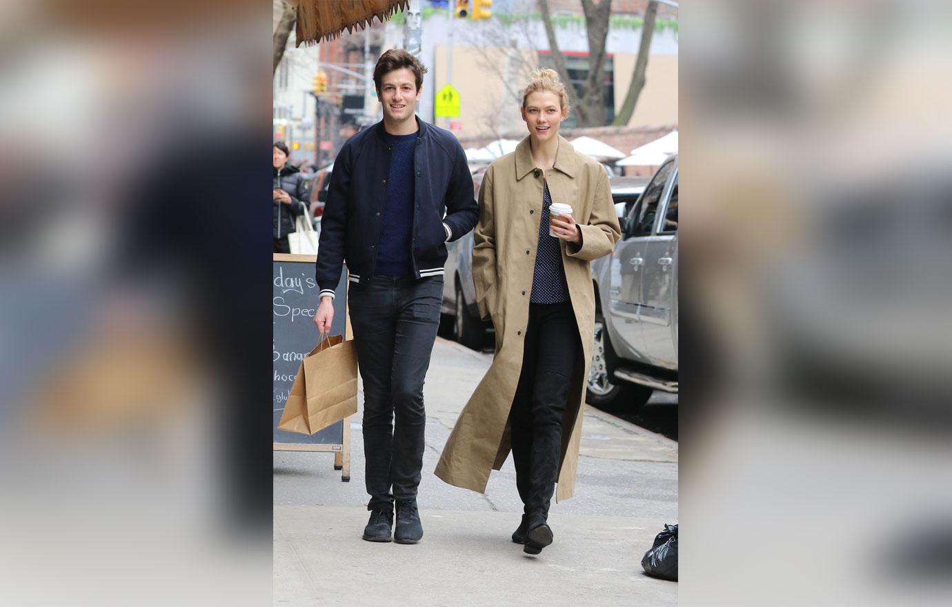 karlie kloss and josh kushner walking with coffee