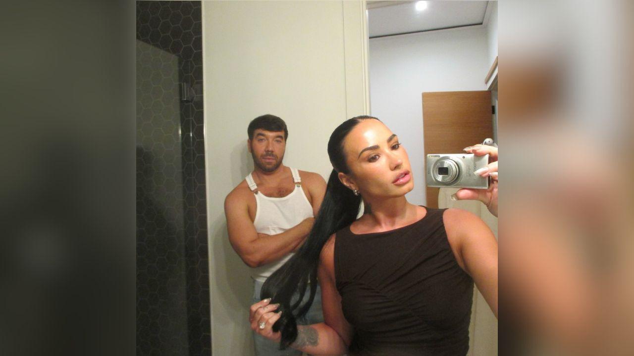 image of The singer posed in a mirror selfie with Matthew Scott Montgomery.