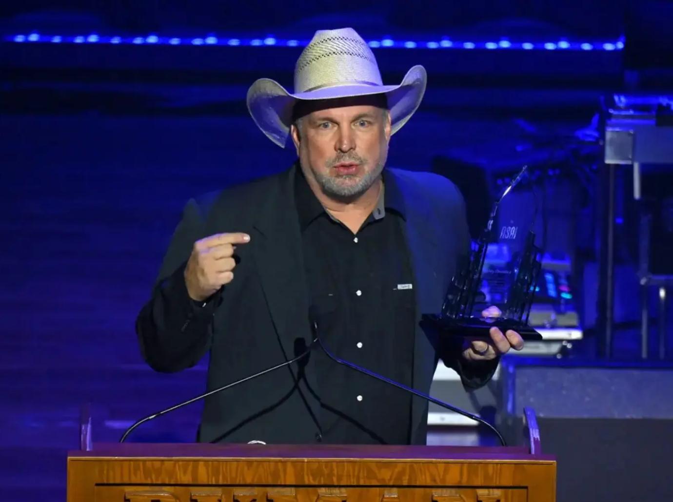 garth brooks accuser believed planned hire murder rape lawsuit