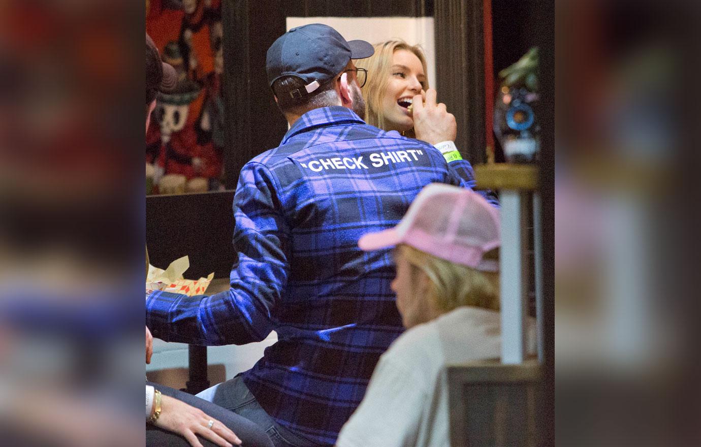 Alex Pall feeds his new girlfriend a burger before they go and see Singer Harry Hudson perform at the El Rey Theater in Los Angeles, CA