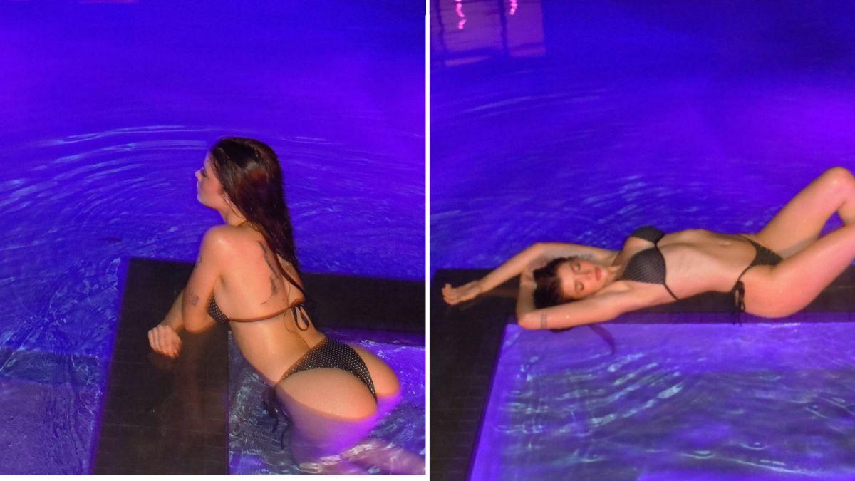 Image of The model showcased her back tattoos while looking away from the camera.