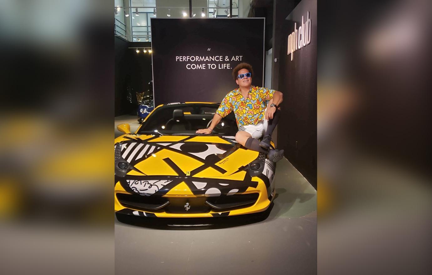 Artist Romero Britto stops by the Prestige Imports Performing Art Pop Up in Miami Design District on October 31, 2019