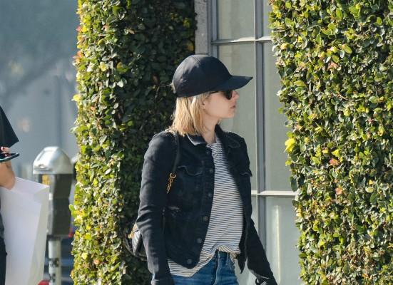 Emma Roberts wears a stylish quilted coat as she returns home from a day of  shopping in LA