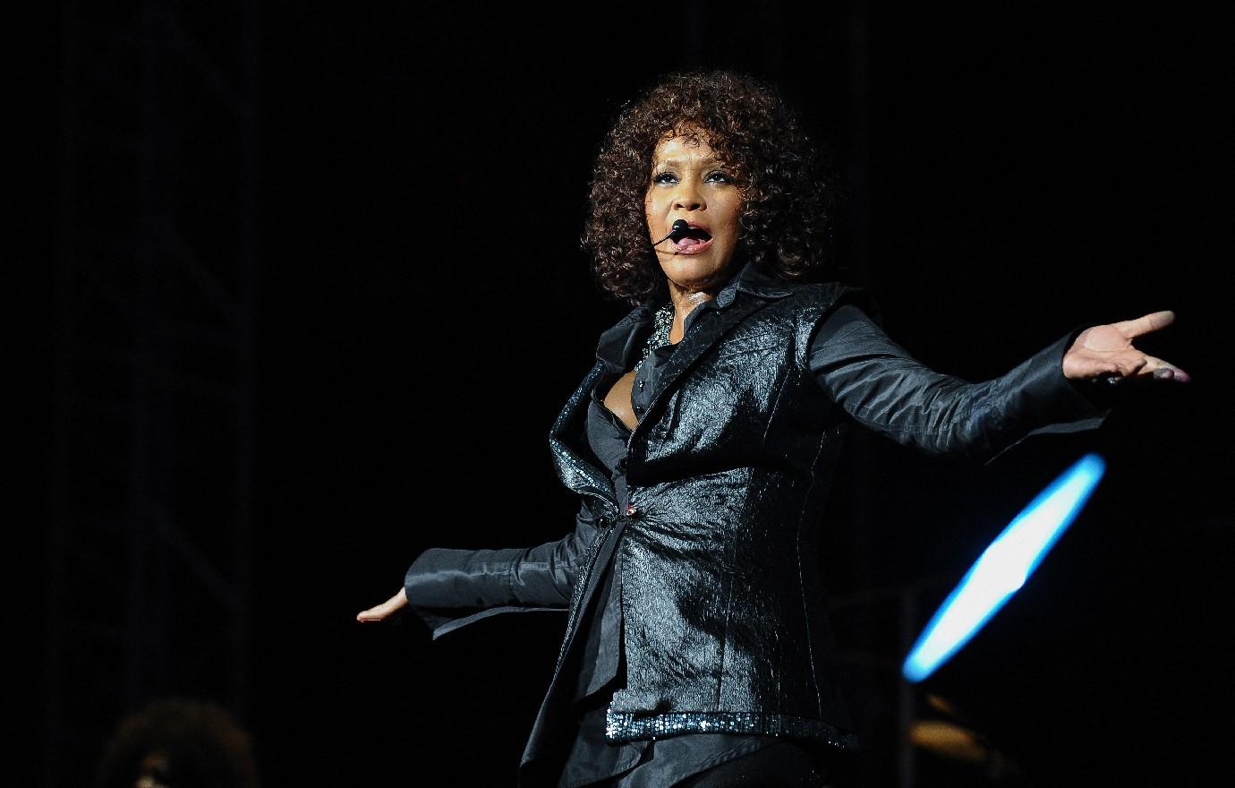 whitney houston felt caged fame friend wanted regular people