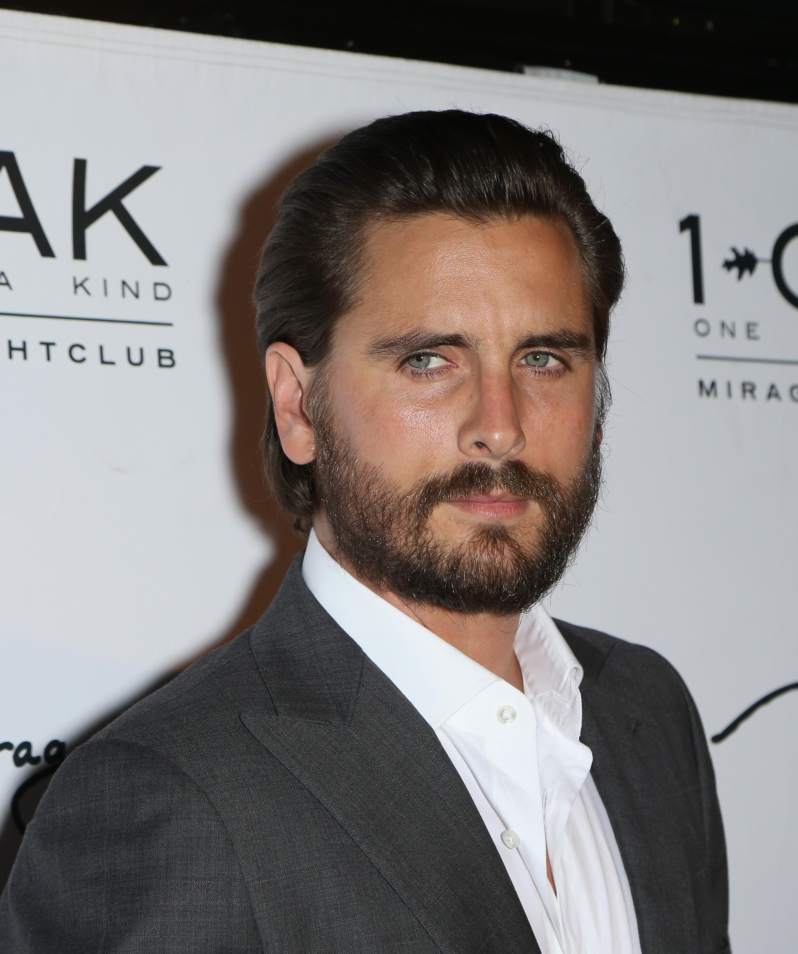 Scott disick wants win kourntey kardashian back