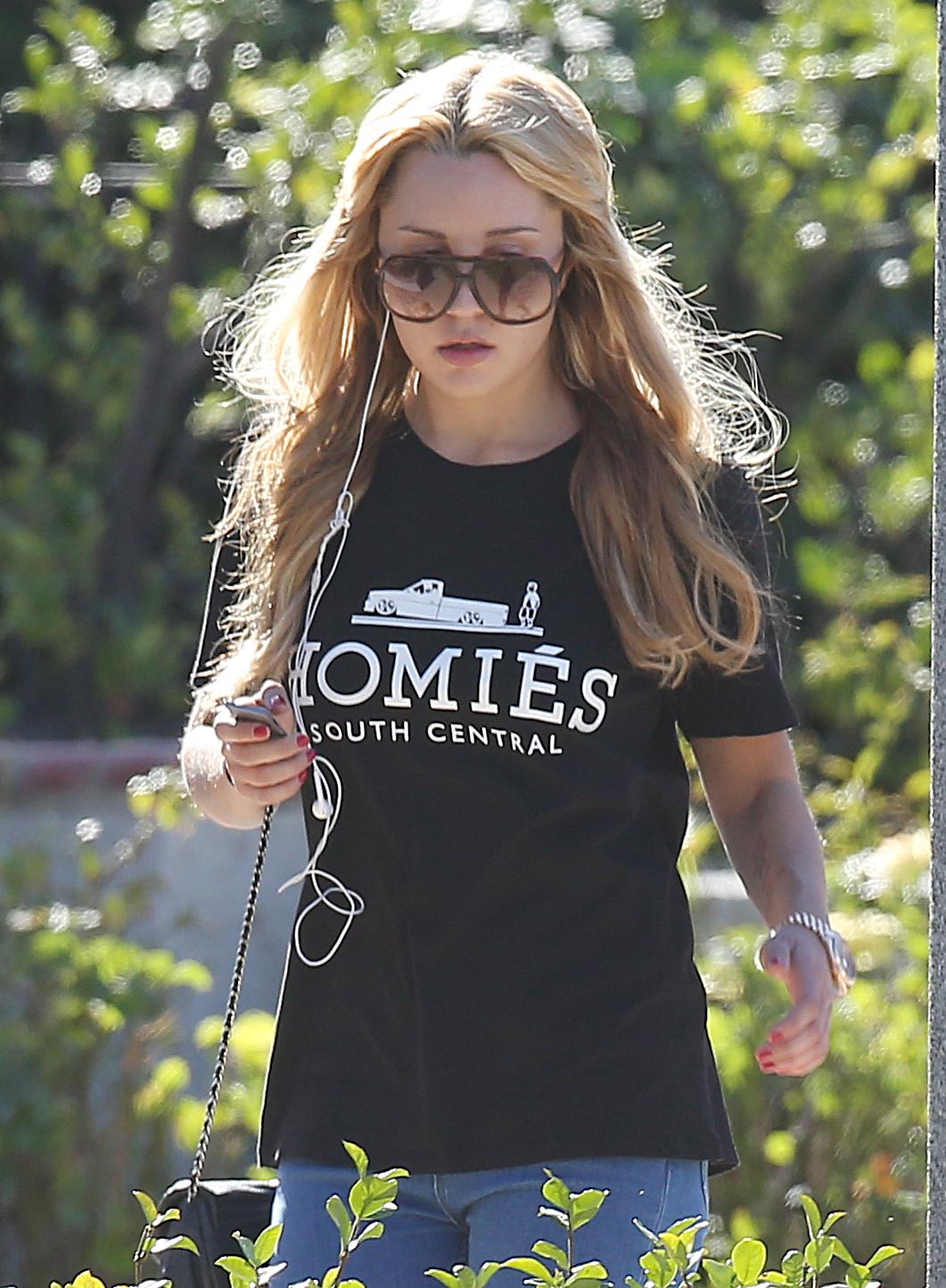 Amanda Bynes takes a morning walk around her neighborhood