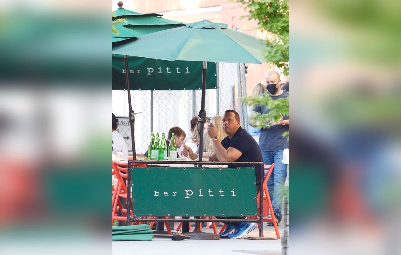 alex rodriguez looks sad as he eats alone in bar pitti