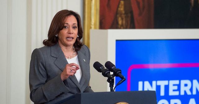 kamala harris joe failing heckled climate change