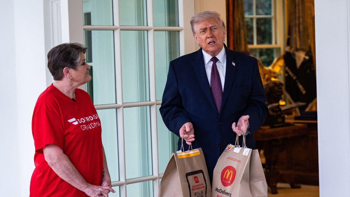 photo of Donald Trump & Door Dash woman.