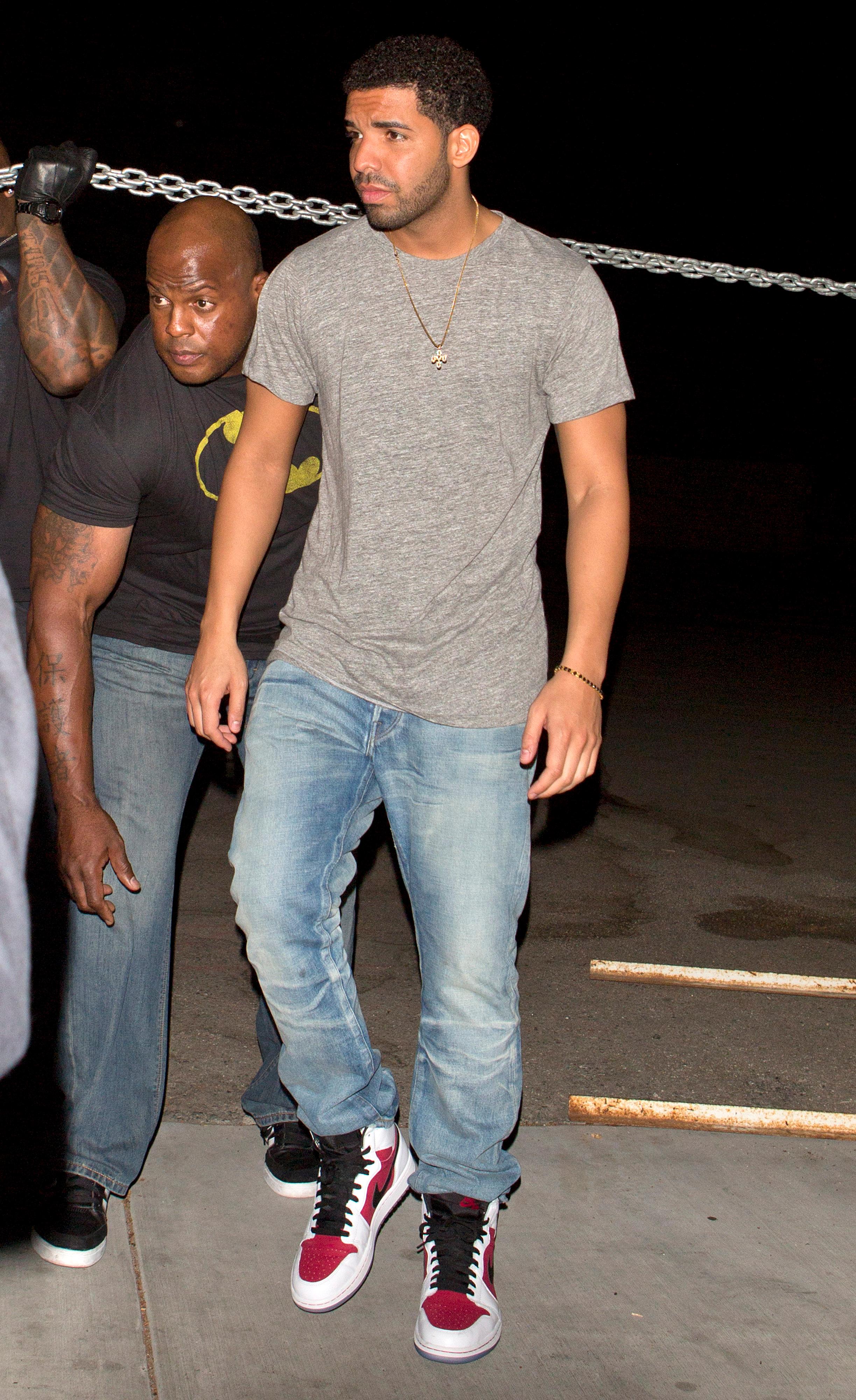 Singer Drake and his bodyguard were seen leaving Hooray Henry&#8217;s nightclub in West Hollywood, CA