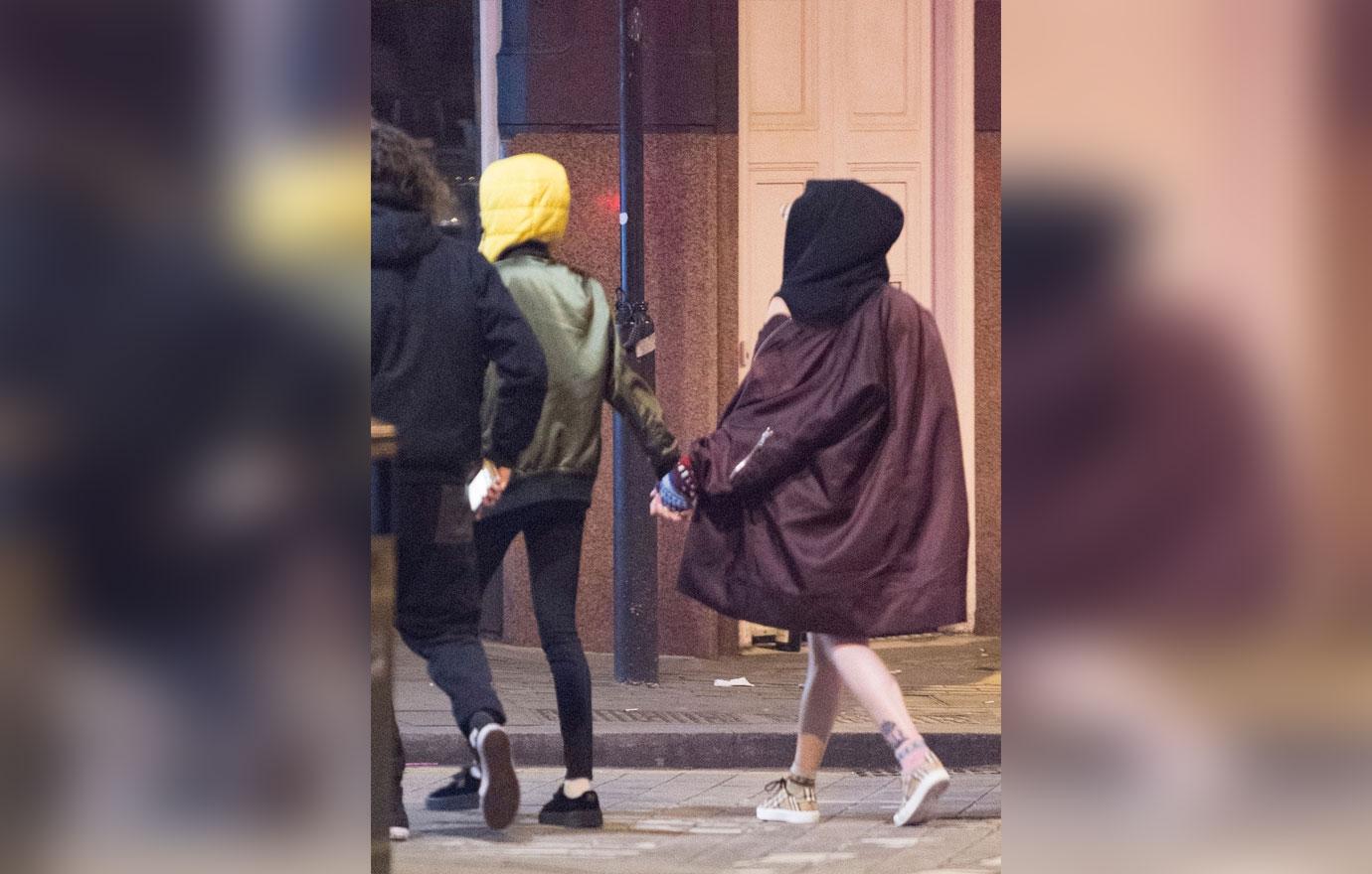 *EXCLUSIVE* Model Cara Delevingne and Paris Jackson hold hands after night of partying in London **WEB MUST CALL FOR PRICING**